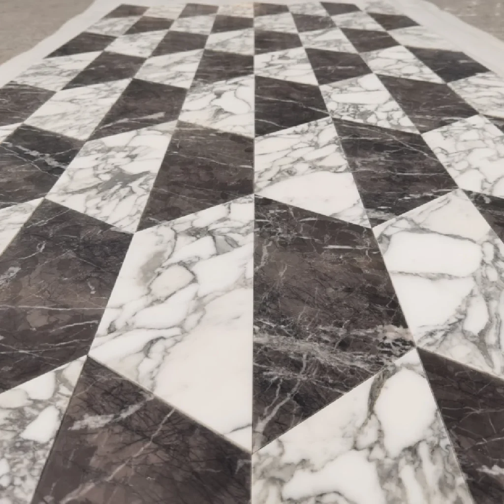 Bespoke modern geometric diamond pattern waterjet medallion using Arabescato White and Italian Grey marble for luxury interior flooring.